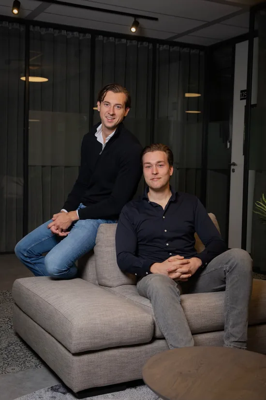 Bram Raijmakers and Benji Wensink, the founders of ZoraMatch, seated in their office